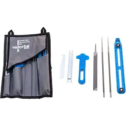 Sada na broušení řetězové pily se brusnými kameny, držákem a příslušenstvím v modrém obalu značky Vallorbe Swiss.