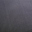 Tmavá látka s drobným pravidelným vzorem z malých světlých teček.