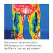 Termografický snímek ukazující rozložení tepla na stehnech a v oblasti rozkroku, kde nejteplejší místa jsou zvýrazněna.