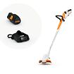 Akumulátorový elektrický vyžínač trávy značky STIHL s nabíječkou a výměnnou baterií.